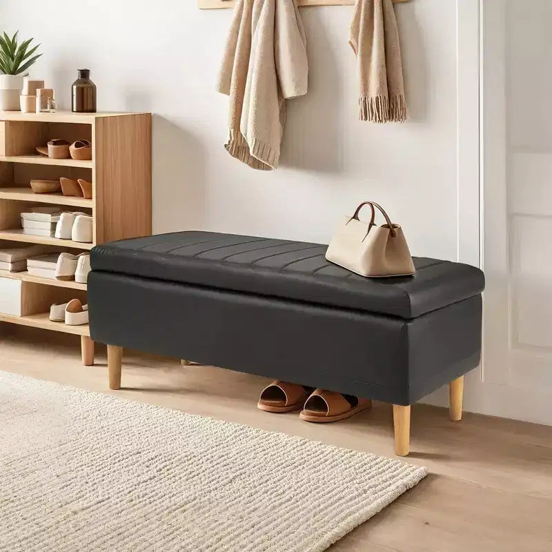 Banc de rangement moderne en cuir synthétique souple, Pouf repose-pieds 44 avec espace de rangement profond de 6,1 po pour salon ou chambre à coucher, facile à nettoyer, Noir