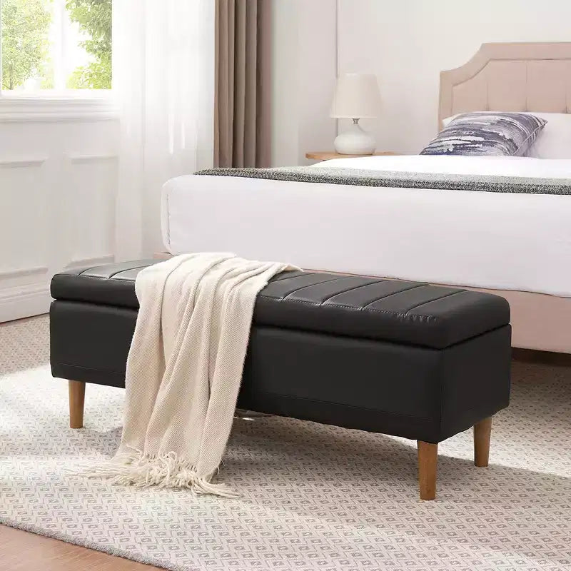Banc de rangement moderne en cuir synthétique souple, Pouf repose-pieds 44 avec espace de rangement profond de 6,1 po pour salon ou chambre à coucher, facile à nettoyer, Noir