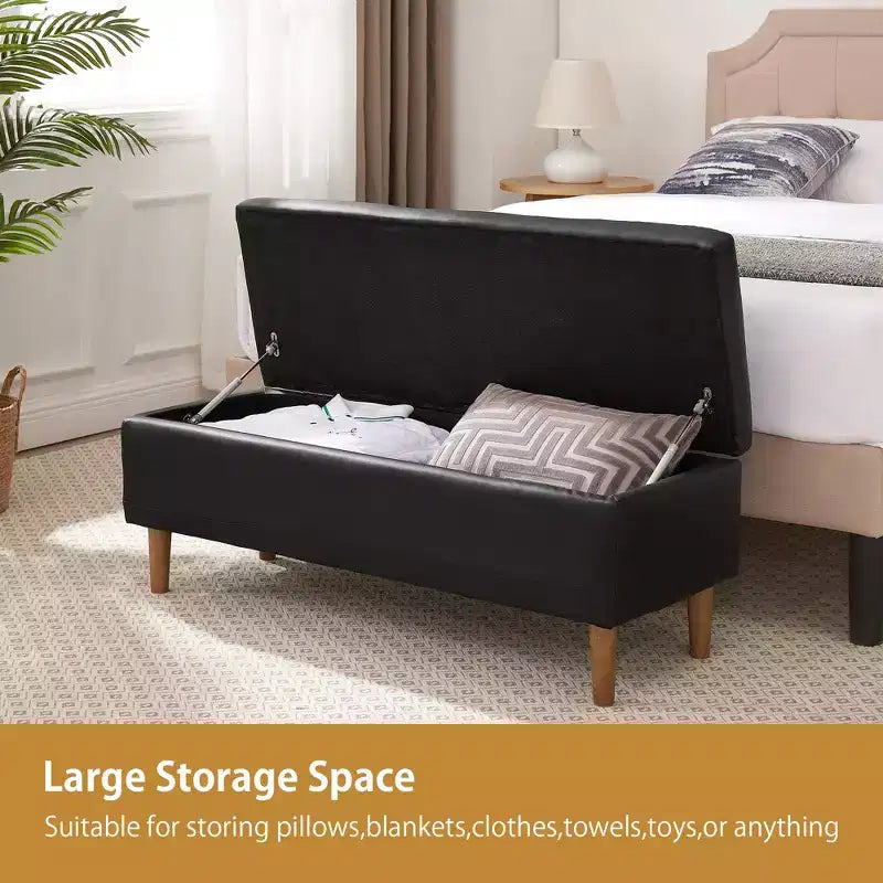 Banc de rangement moderne en cuir synthétique souple, Pouf repose-pieds 44 avec espace de rangement profond de 6,1 po pour salon ou chambre à coucher, facile à nettoyer, Noir